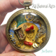 Illustration for article titled Enjoy These Clever Miniature Sculptures Made From Old Clock Parts